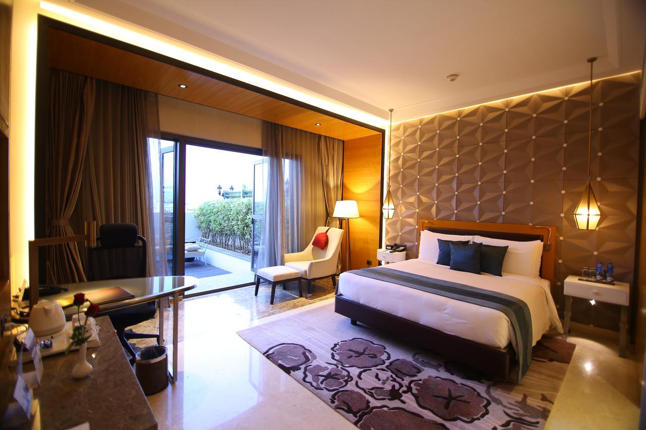 Radisson Blu Kójamputtúr Exteriér fotografie A room at the hotel