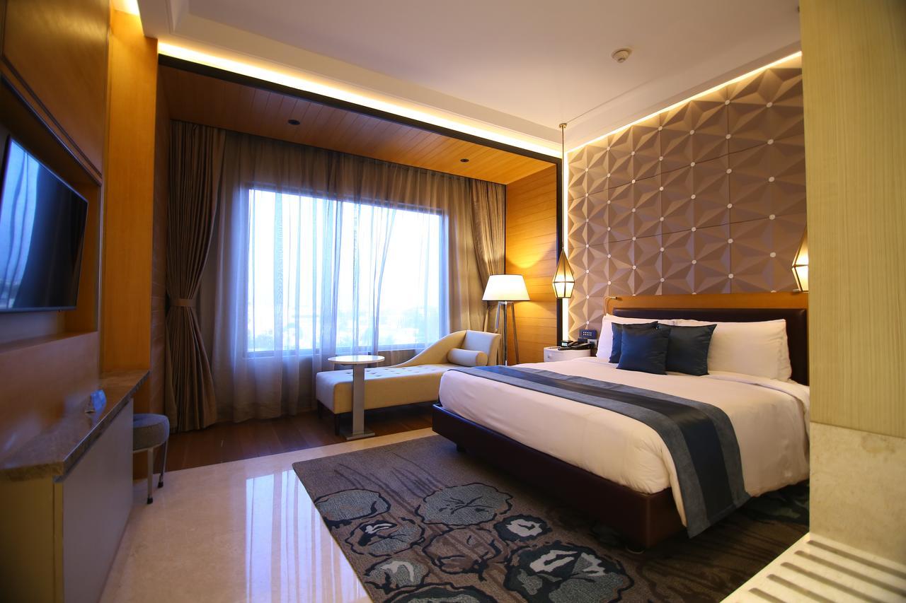 Radisson Blu Kójamputtúr Exteriér fotografie Deluxe Room